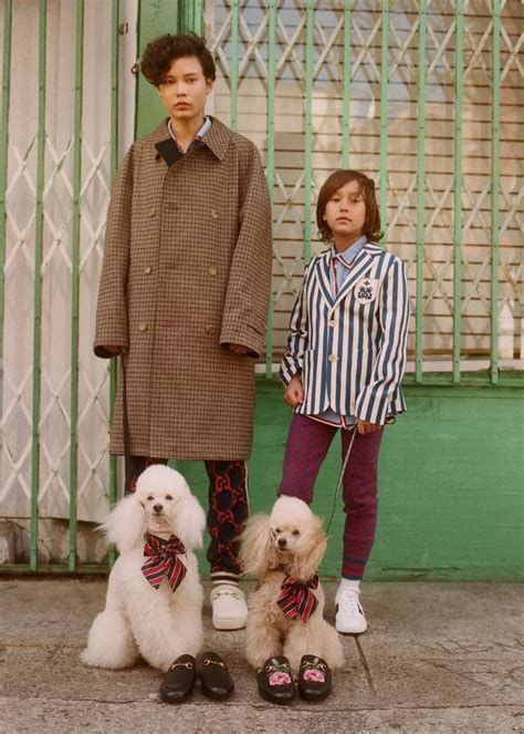 photo famille gucci|Different types of families wear Gucci on the streets of New York .